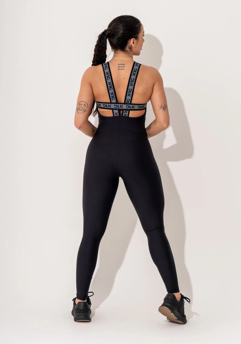Macacão fitness feminino preto com alça de elástico canelado Intense